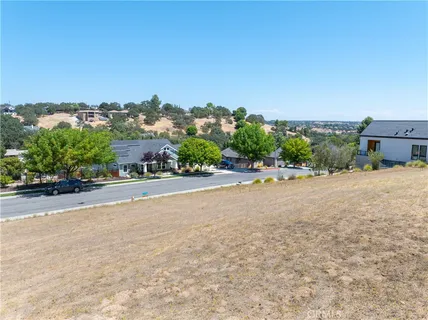a street with a building in the background