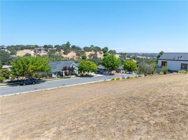 a street with a building in the background