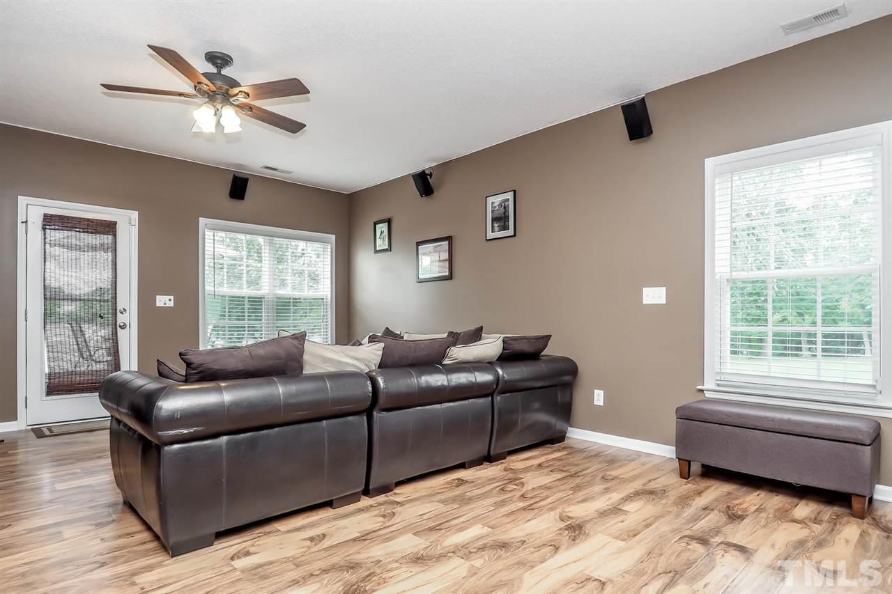 2341 Persimmon Ridge Drive Raleigh, NC 27604 - Photo 15 of 25 a living room with furniture and windows