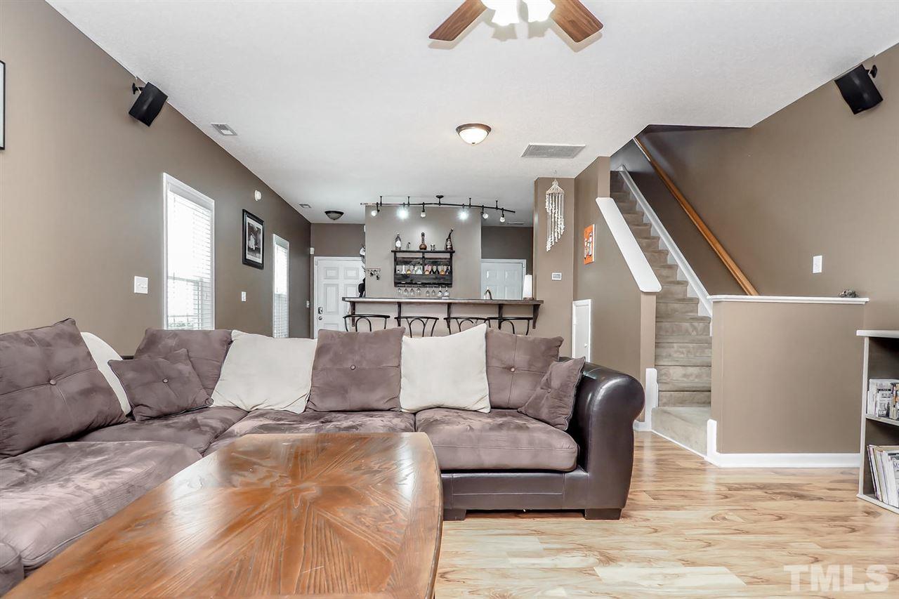 2341 Persimmon Ridge Drive Raleigh, NC 27604 - Photo 16 of 25 a living room with furniture and wooden floor