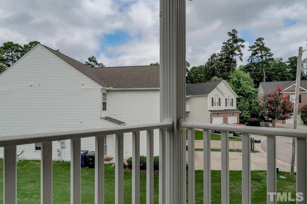 2341 Persimmon Ridge Drive Raleigh, NC 27604 - Photo 22 of 25 a view of a house with wooden fence