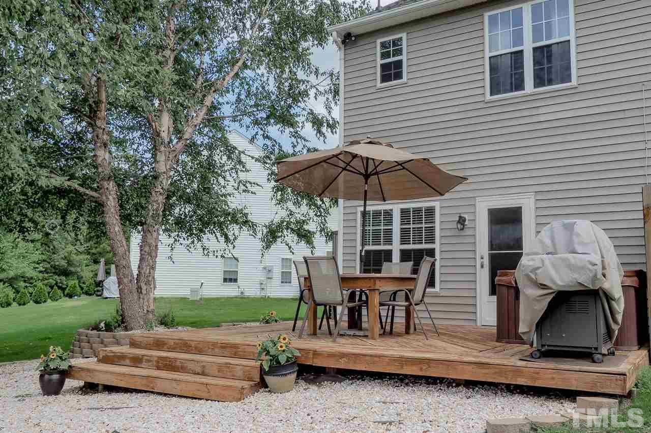 2341 Persimmon Ridge Drive Raleigh, NC 27604 - Photo 5 of 25 a view of backyard with deck and outdoor seating