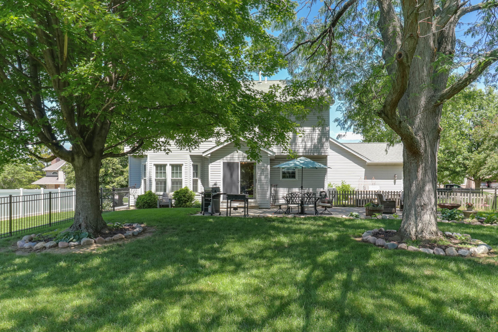 3203 Eagle Crest Road Bloomington, IL 61704 - Photo 41 of 52 a front view of a house with a yard