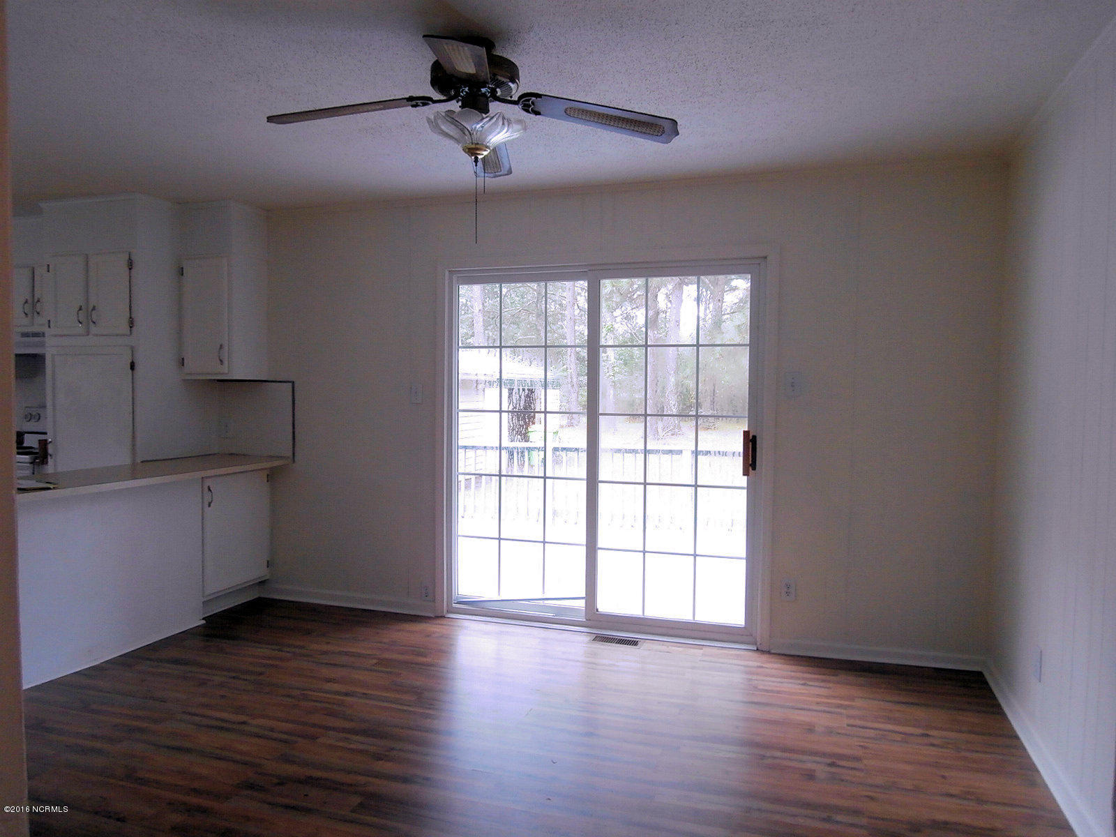 166 Dead End Road Enfield, NC 27823 - Photo 5 of 20 Dining Room view 1 - with French Doors that exit to the rear Deck.