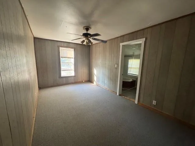a view of empty room with windows