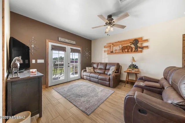 a living room with furniture and a window