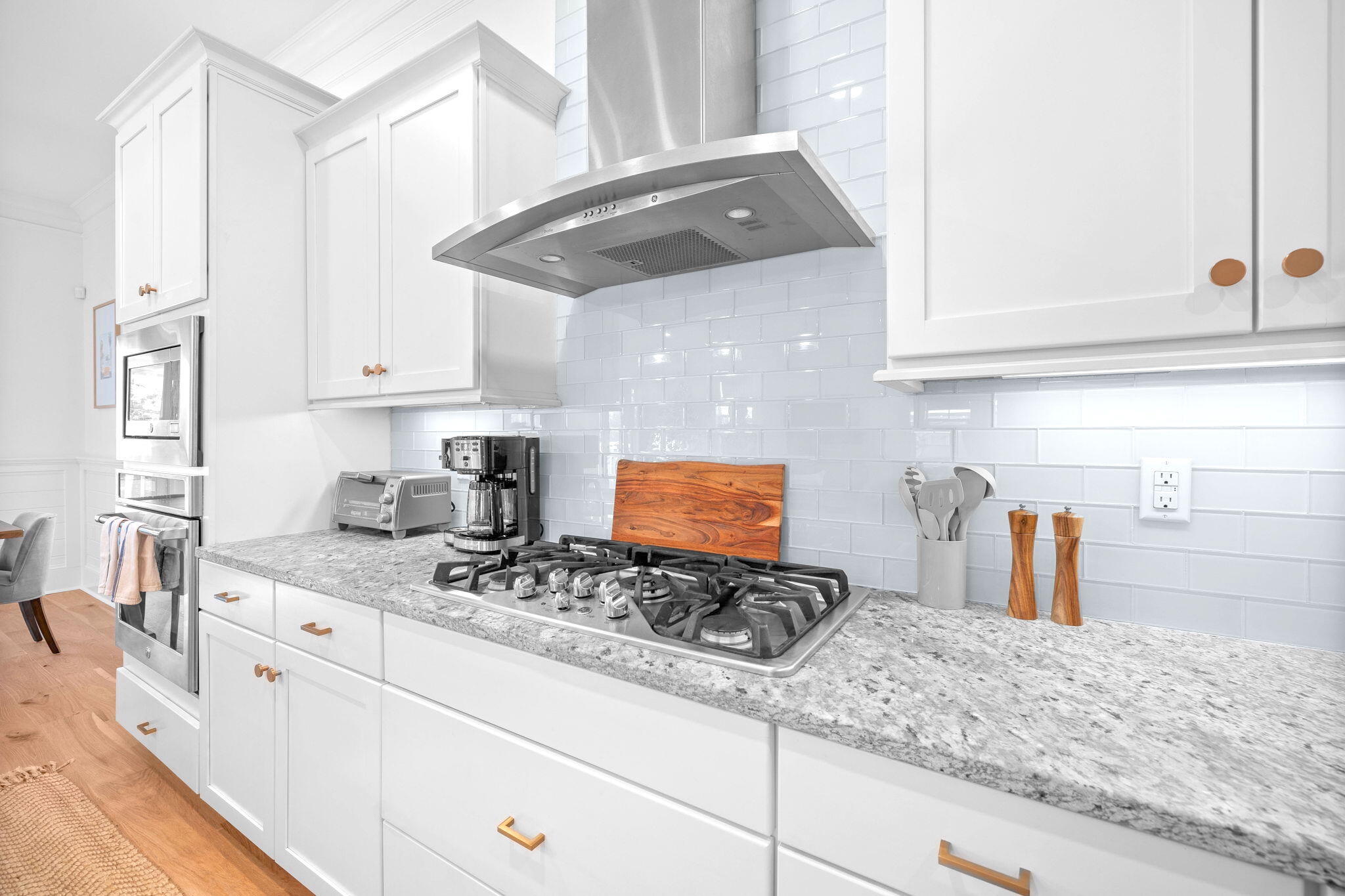 49 Clipper Street Inlet Beach, FL 32461 - Photo 31 of 51 a kitchen with stainless steel appliances granite countertop a sink stove and cabinets