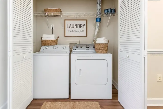 a utility room with dryer and washer