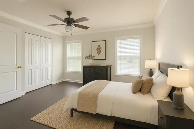 a bedroom with a bed and window