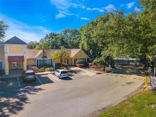 a view of a swimming pool with lounge chairs