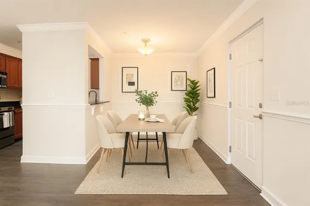 a view of a dining room with furniture