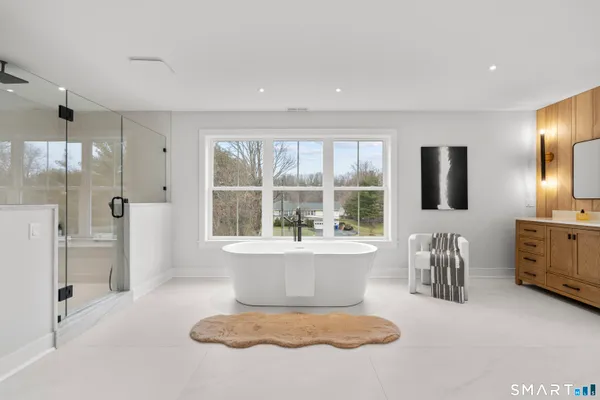 a bathroom with a sink a toilet and a bathtub