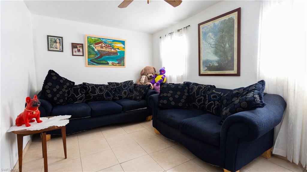 1230 Ramsdel Street Port Charlotte, FL 33952 - Photo 22 of 37 a living room with furniture and a window