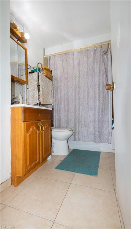 1230 Ramsdel Street Port Charlotte, FL 33952 - Photo 24 of 37 a bathroom with a sink toilet and shower