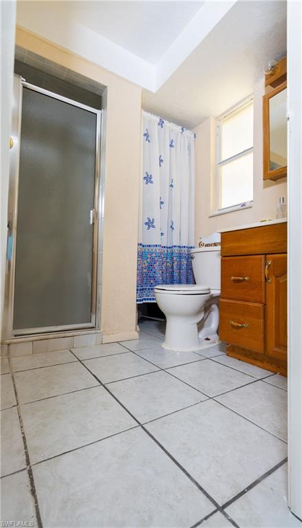 1230 Ramsdel Street Port Charlotte, FL 33952 - Photo 26 of 37 a bathroom with a sink toilet and shower