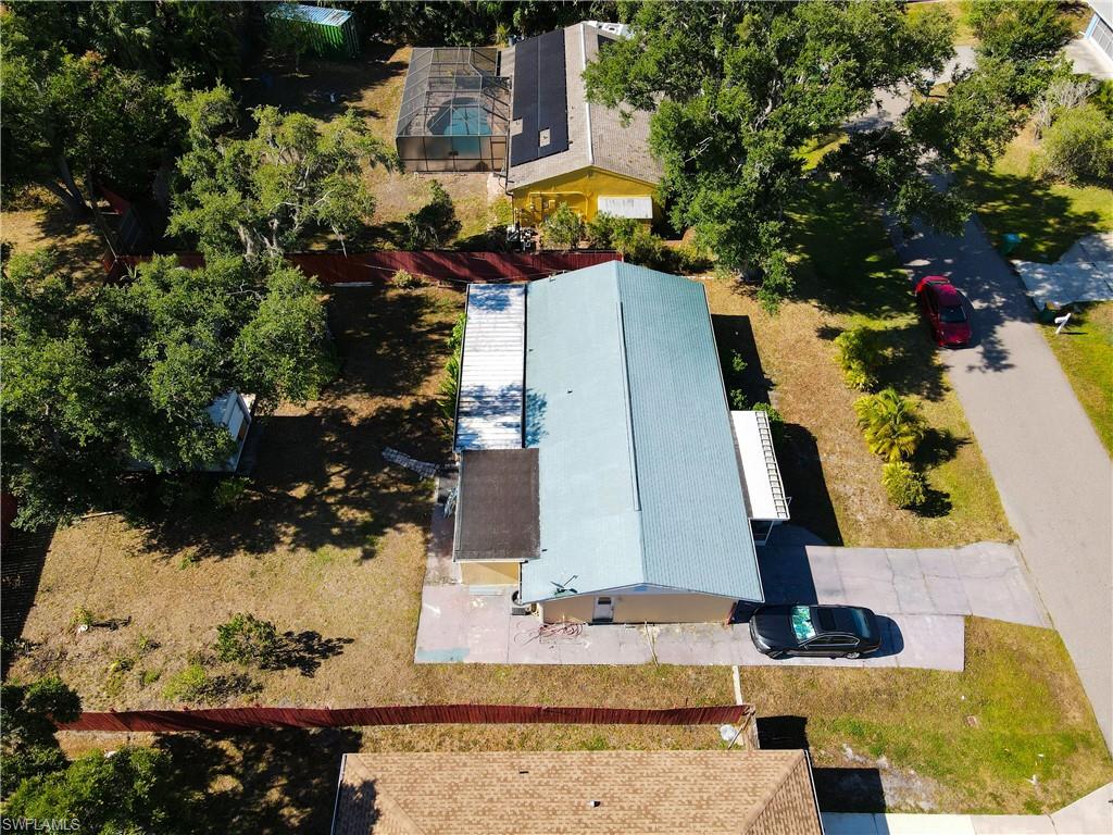1230 Ramsdel Street Port Charlotte, FL 33952 - Photo 34 of 37 aerial view of a house with a yard
