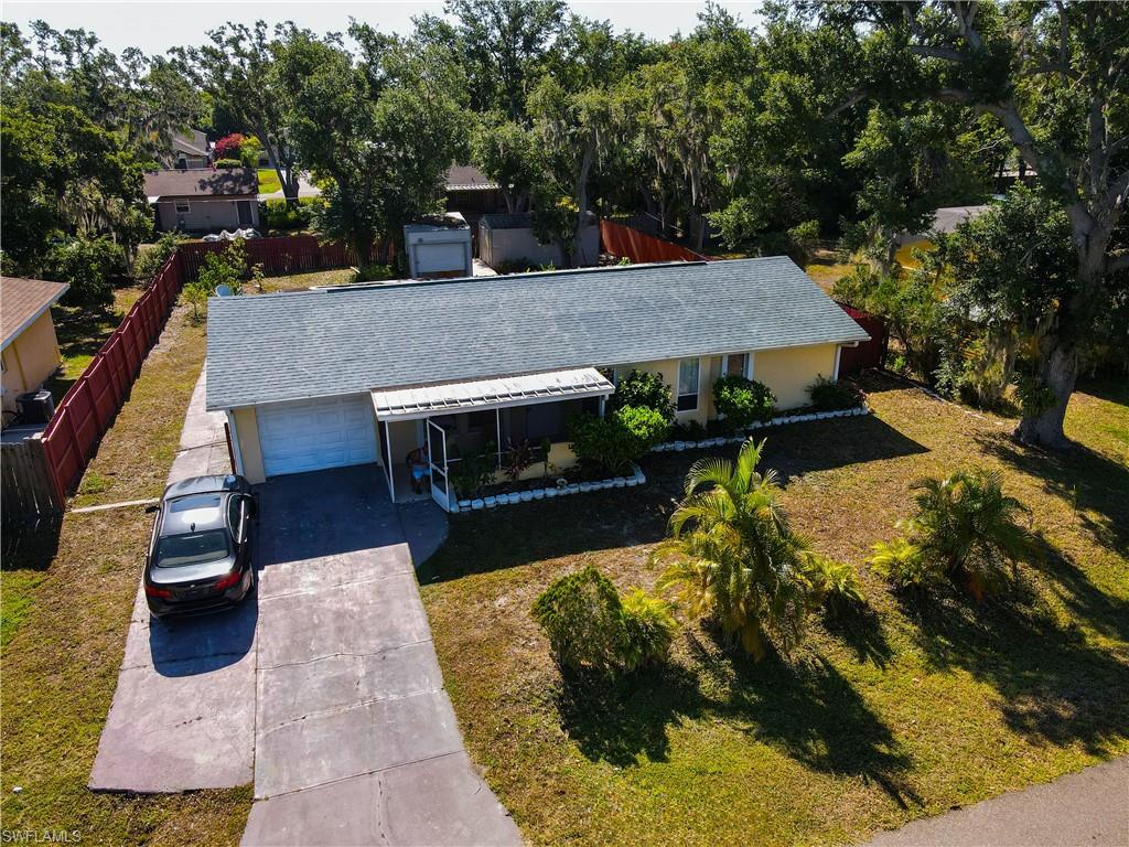 1230 Ramsdel Street Port Charlotte, FL 33952 - Photo 37 of 37 a view of a yard with plants