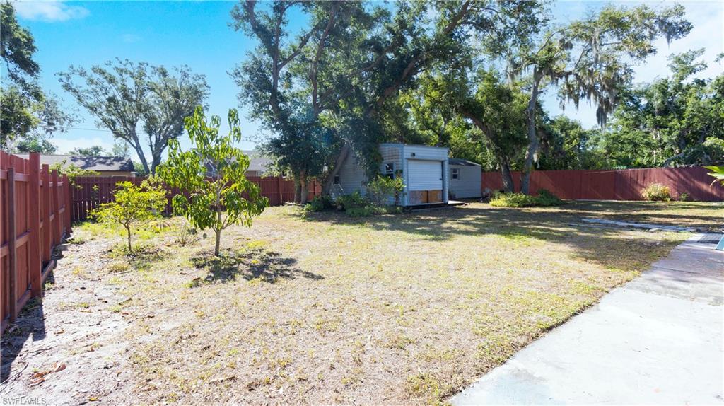 1230 Ramsdel Street Port Charlotte, FL 33952 - Photo 8 of 37 a view of swimming pool with a yard