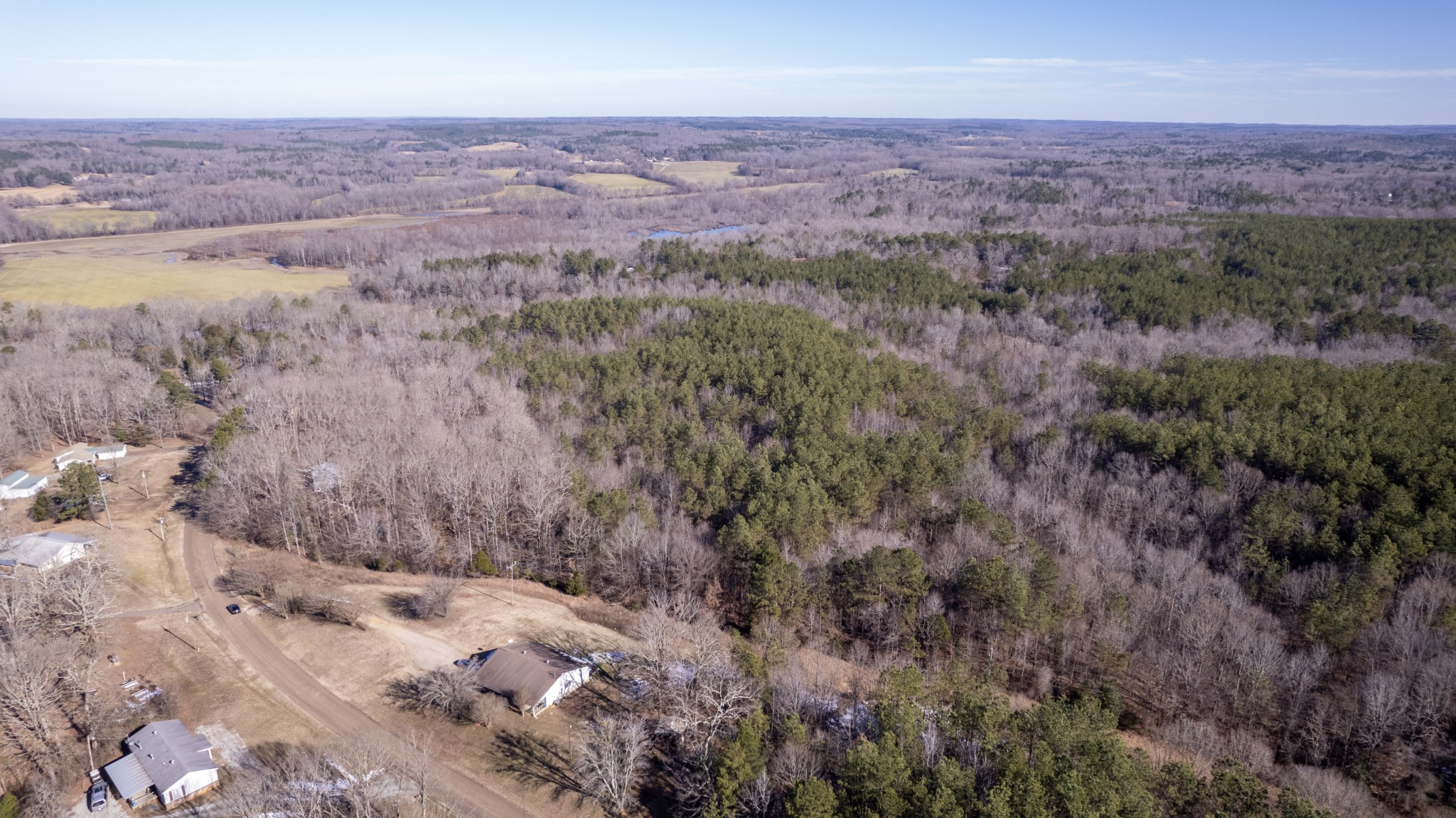 0 Walnut Grove Road Bolivar, TN 38008 - Photo 4 of 8 an aerial view of house with yard and mountain in the background