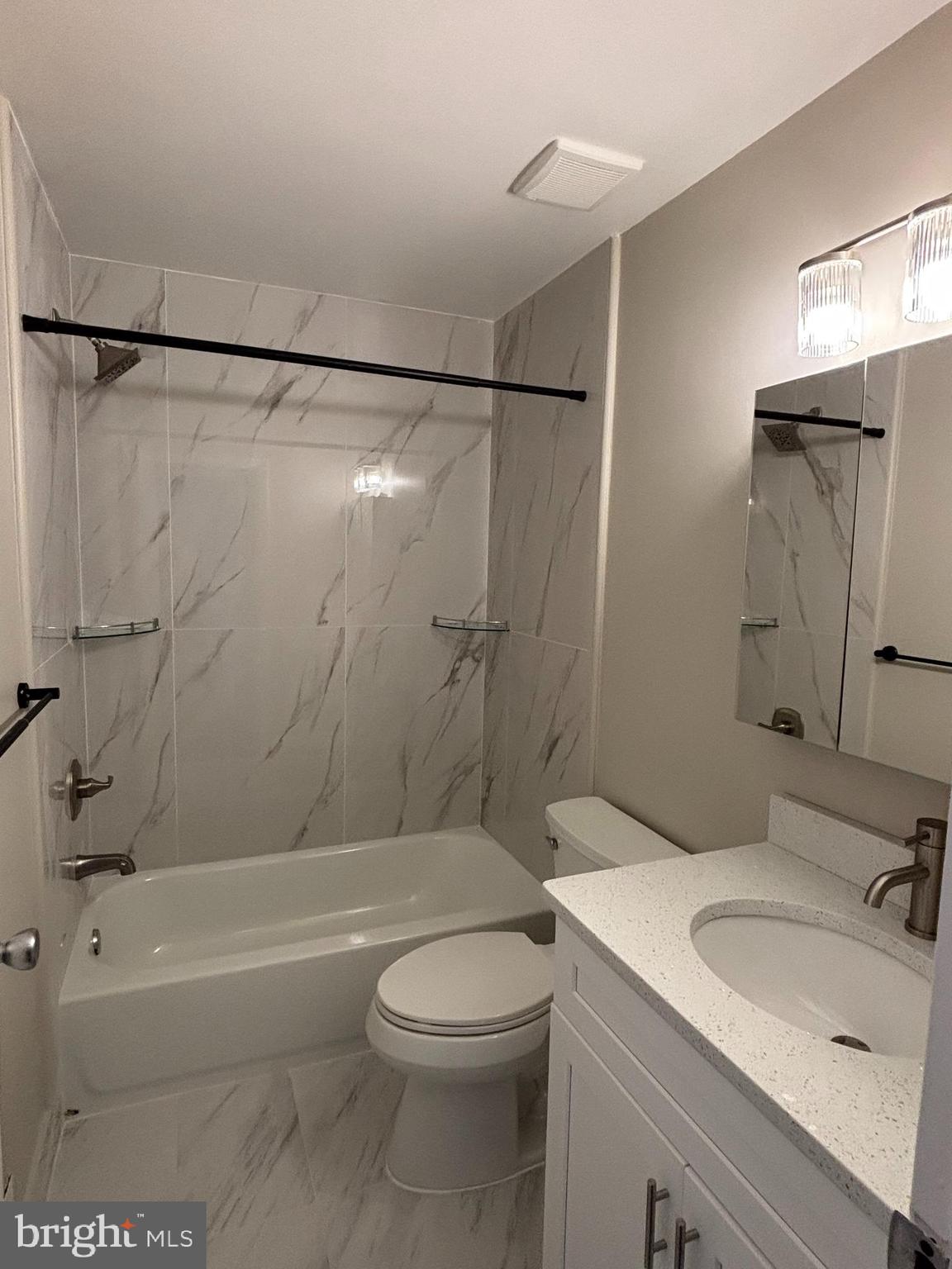 104 Chaucer Road, Unit A Mount Laurel, NJ 08054 - Photo 14 of 20 a bathroom with a sink a toilet and shower