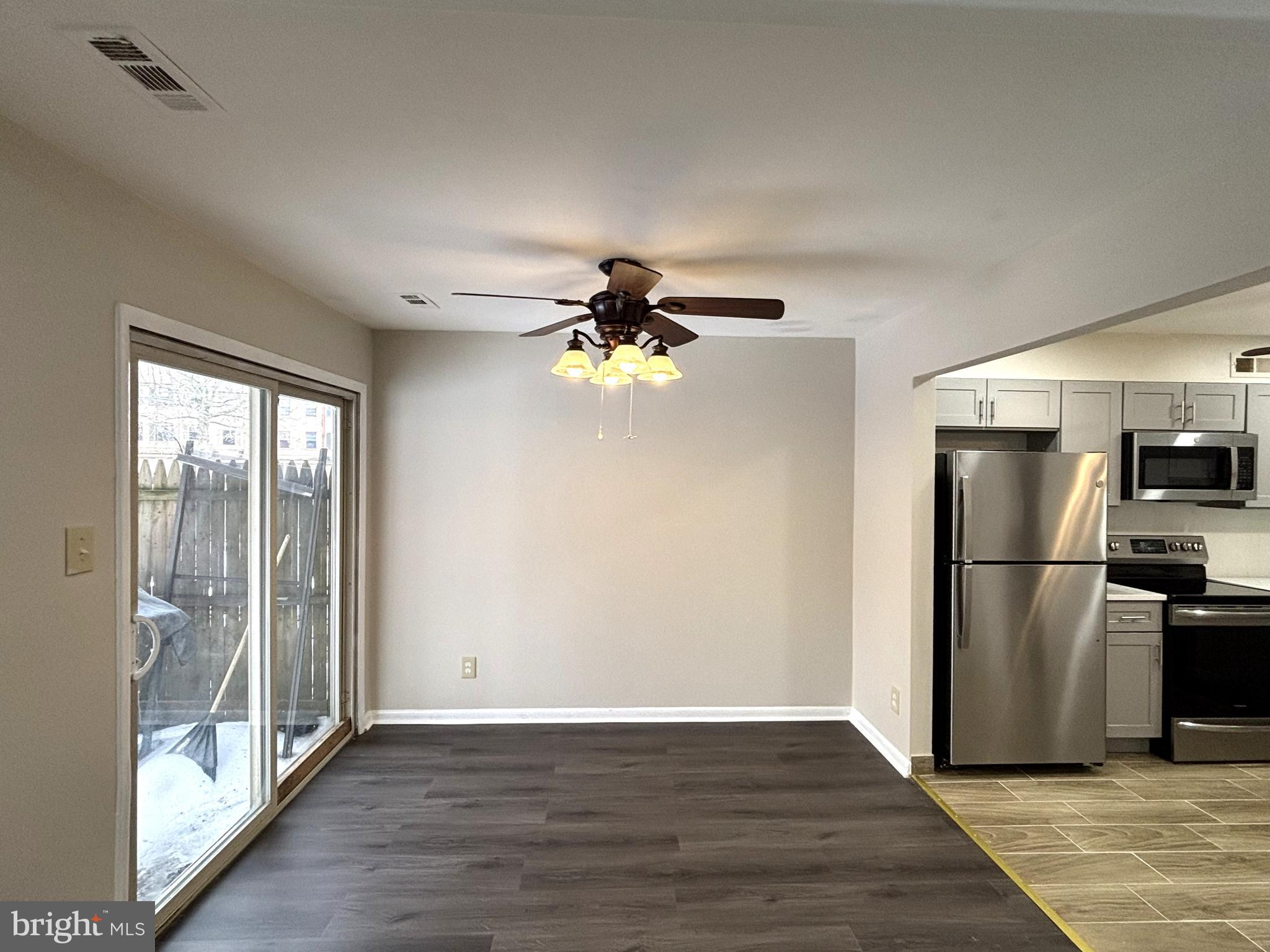 104 Chaucer Road, Unit A Mount Laurel, NJ 08054 - Photo 8 of 20 a view of a livingroom with a ceiling fan