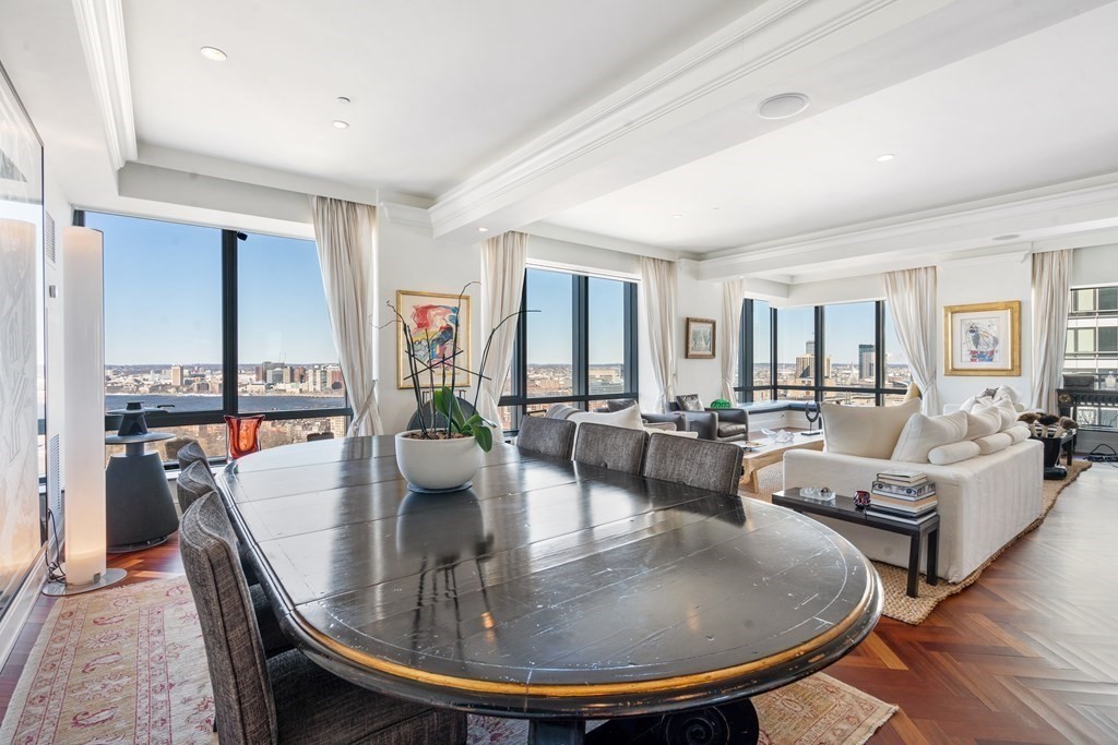 2 Avery Street, Unit 30EF Boston, MA 02111 - Photo 2 of 35 a dining room with furniture