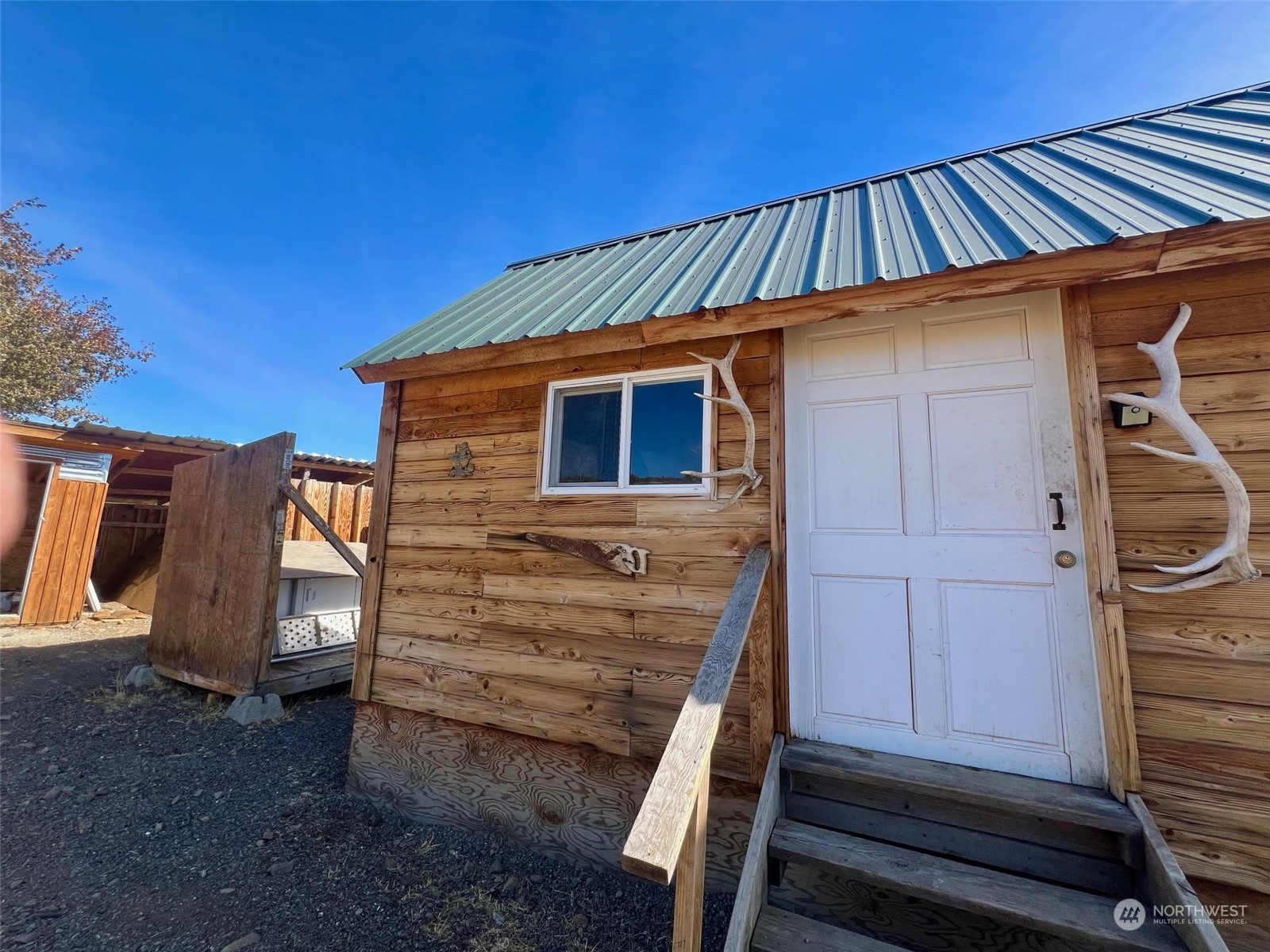 571 Trail Creek Road Ellensburg, WA 98926 - Photo 5 of 9 a view of a house with wooden fence