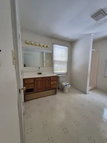 a view of kitchen with furniture and window