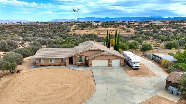 a view of a livingroom with furniture and a chair