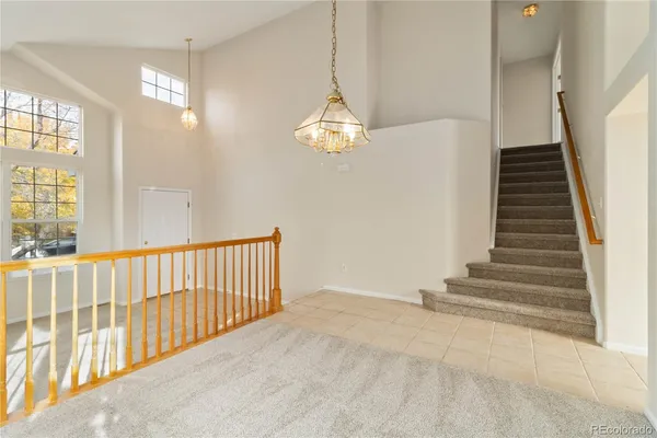 a view of a hallway with windows