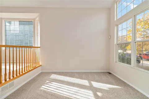 a view of a room that has a window in it