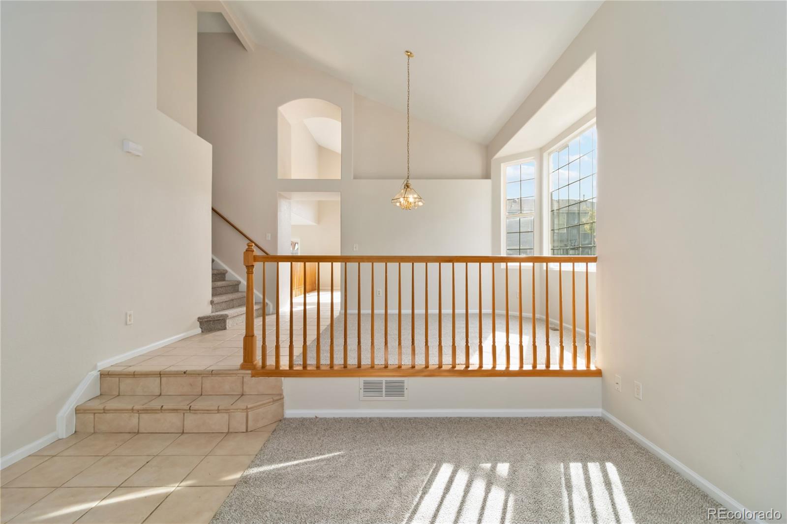 5124 Enid Way Denver, CO 80239 - Photo 9 of 47 en empty room with windows