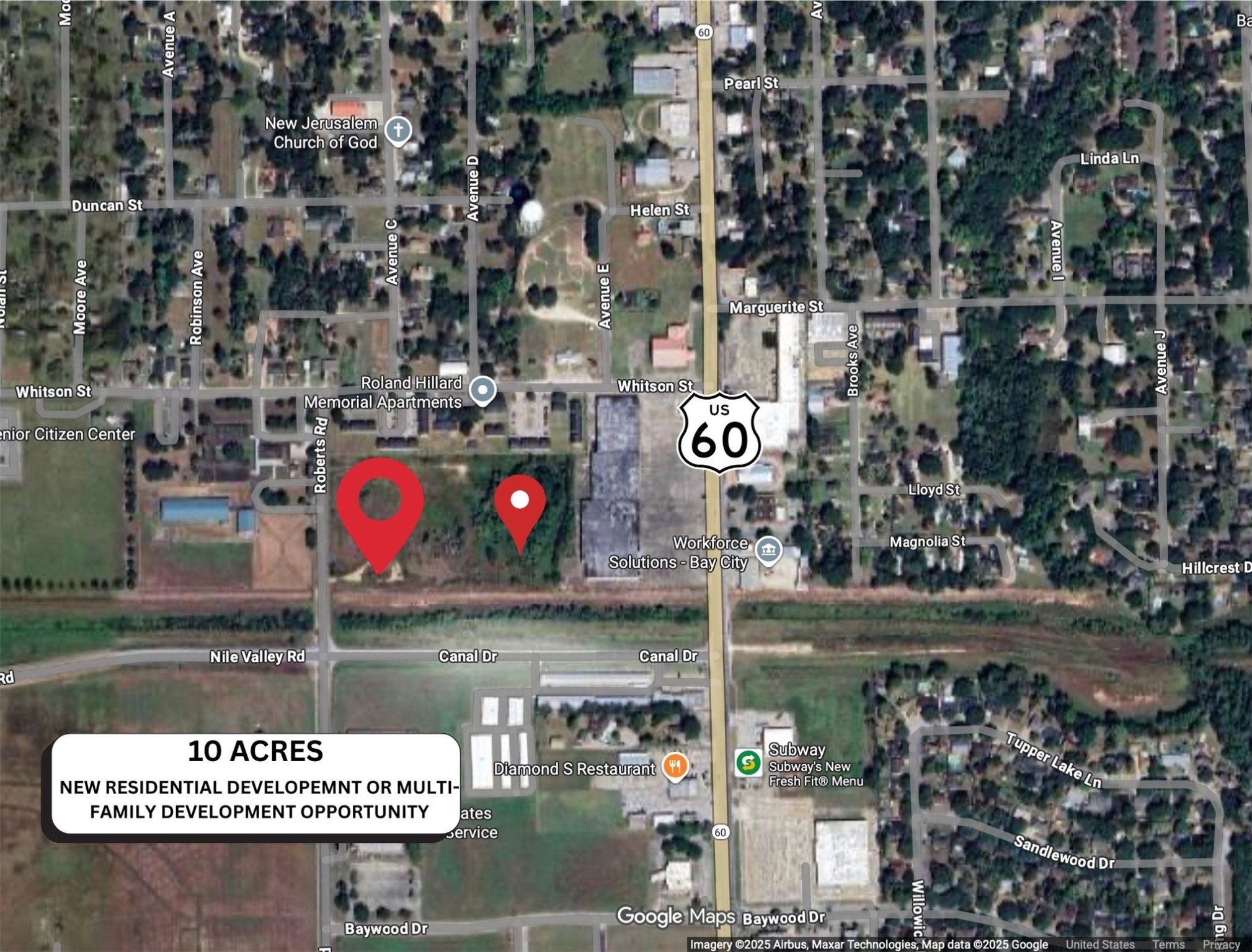 a sign that is on a brick wall