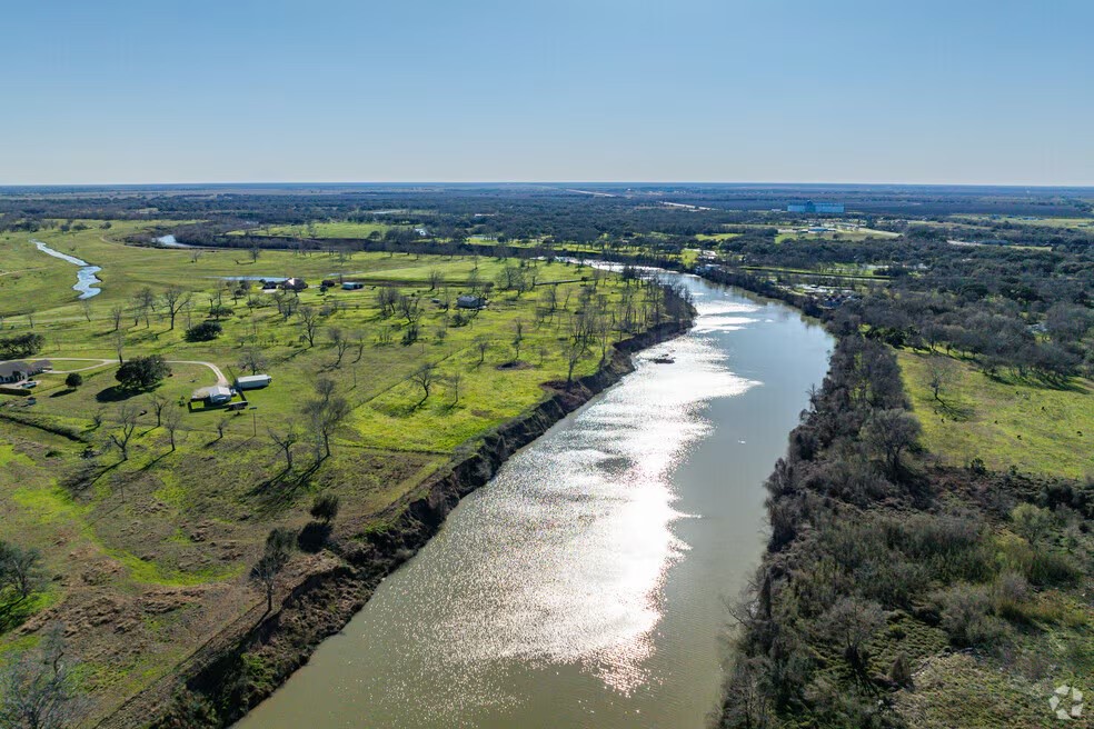 3511 Roberts Road Bay City, TX 77414 - Photo 8 of 14 a view of a lake with a city