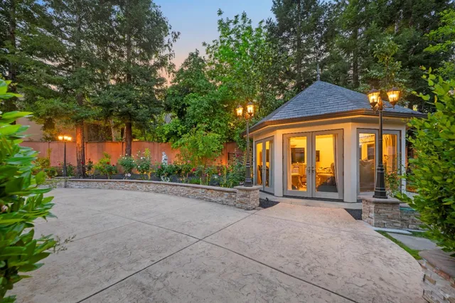 a view of a livingroom with furniture and a chandelier