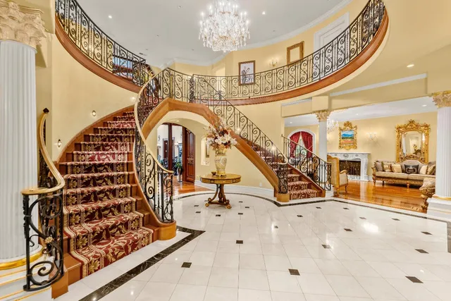 a bedroom with a bed chair and window