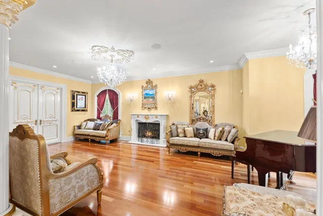 a view of a chairs and tables in the balcony