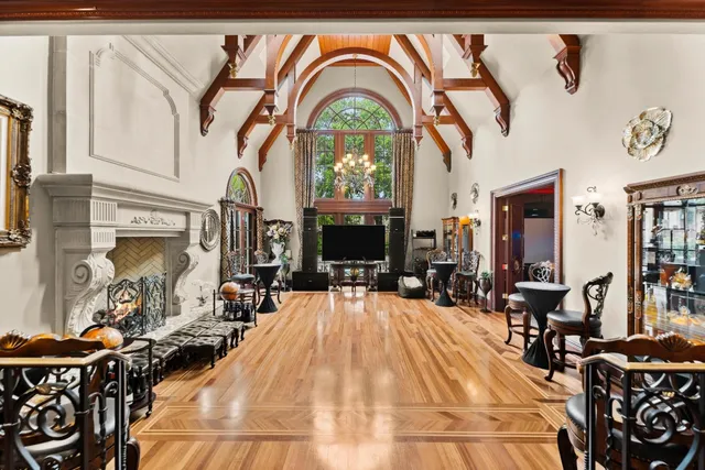 a bed room with a bed and a large window