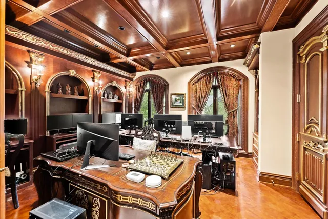 a bed room with a bed and a large window