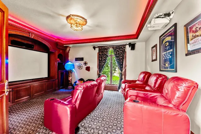a kitchen with a stove and a wooden floor