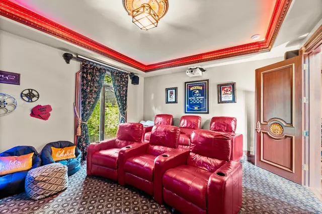 a view of a building with potted plants and a bench