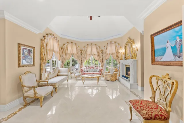an aerial view of a house with a swimming pool