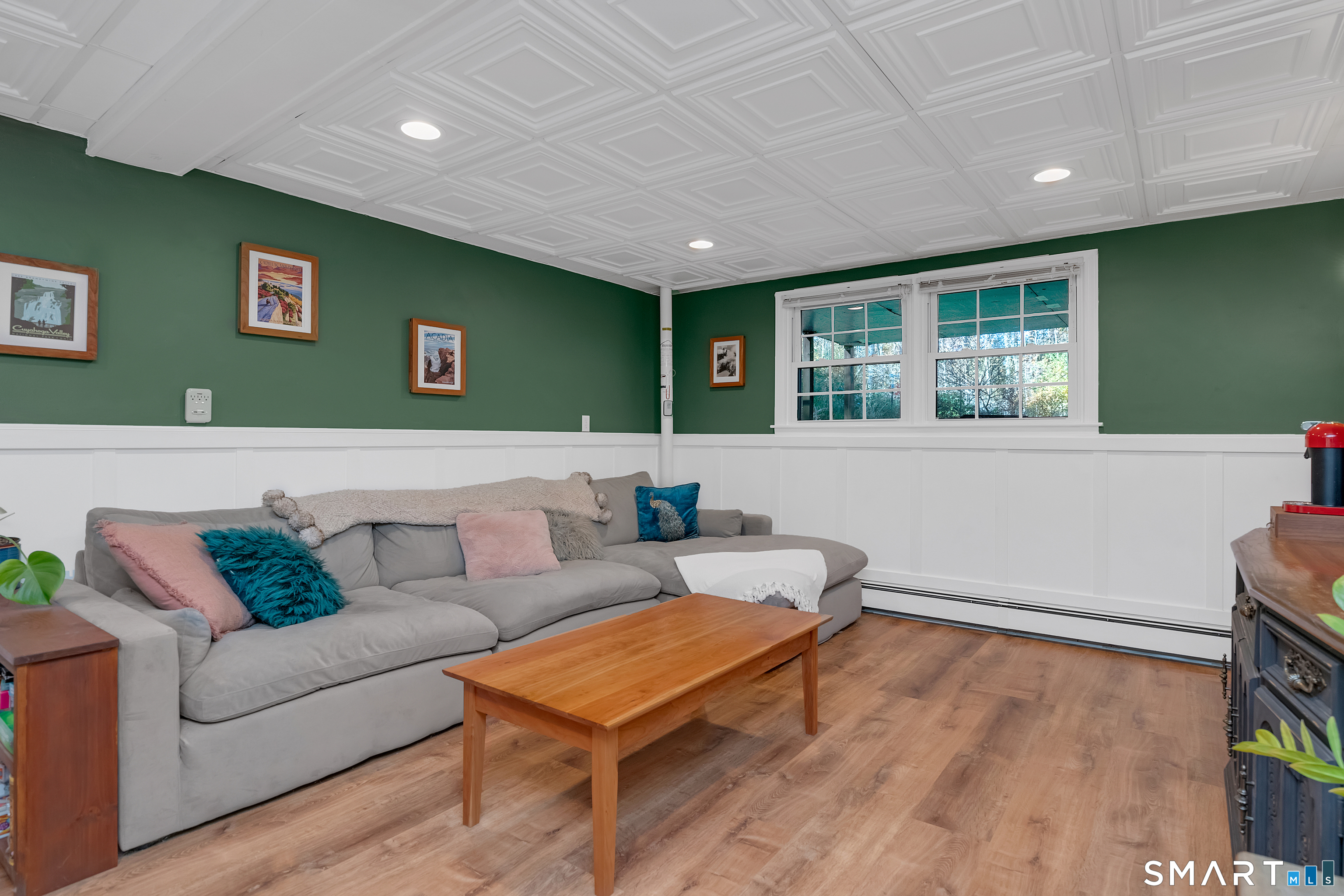 16 Marion Road Bethany, CT 06524 - Photo 28 of 40 a living room with furniture and a window