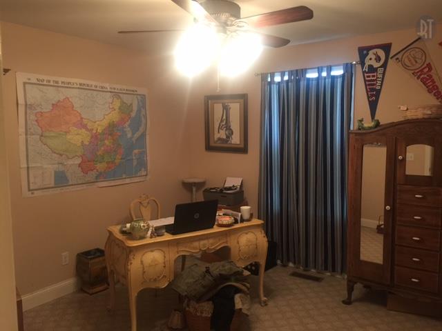 2052 Pete Sain Road Manchester, TN 37355 - Photo 7 of 13 a room with furniture and paintings on the wall