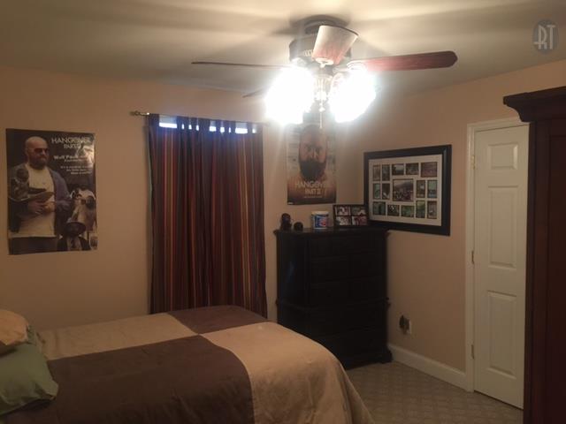 2052 Pete Sain Road Manchester, TN 37355 - Photo 8 of 13 a bedroom with a bed and a mirror