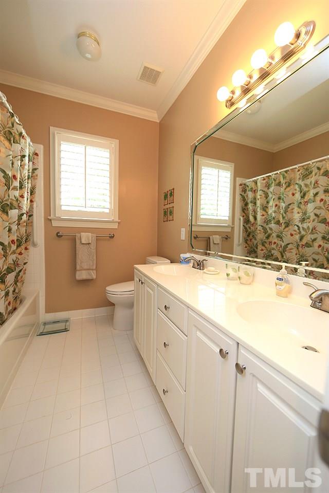 5800 Valley Mist Court Raleigh, NC 27613 - Photo 25 of 30 Double Vanity, great lighting, ceramic floor, tub/shower combo