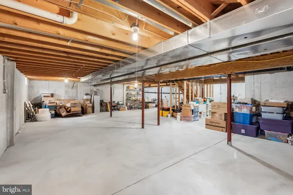 a view of parking garage with furniture