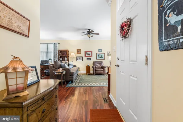 a view of a living room and dining room