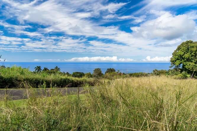 Ocean views in a private, gated subdivision in the highly desirable neighborhood of Holualoa.