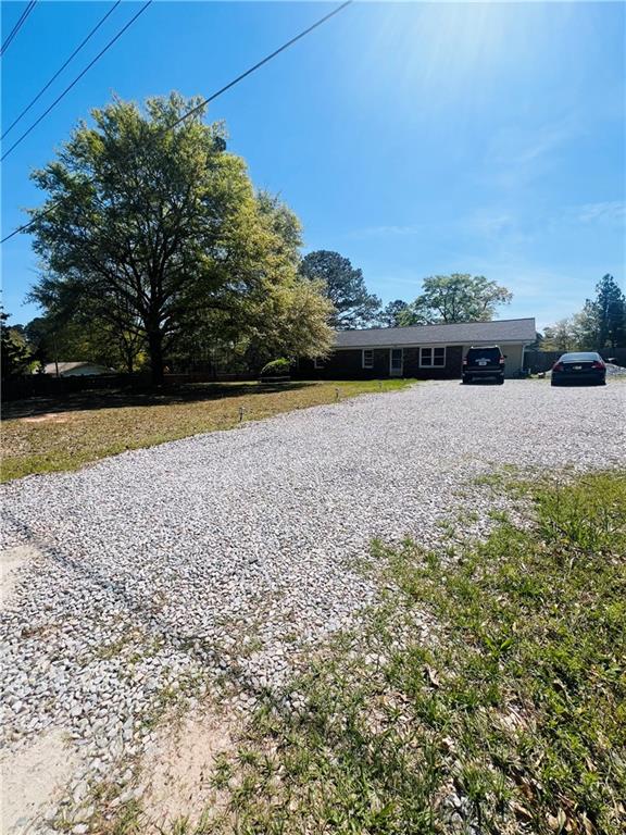 a view of a yard with an outdoor space